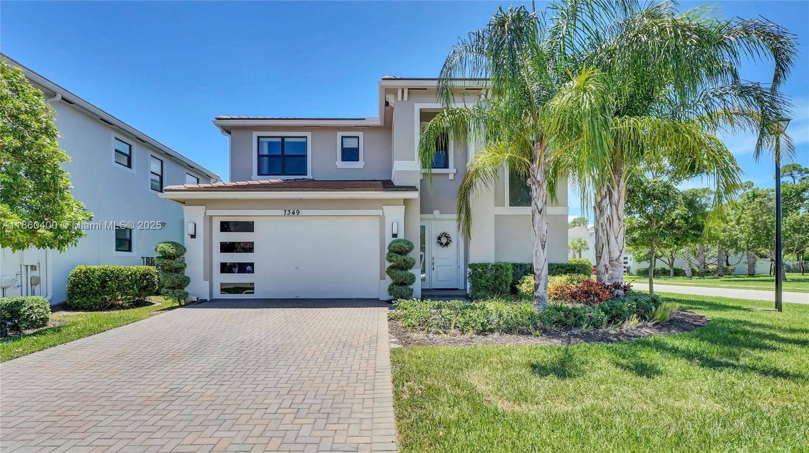 This beautiful corner lot, built in 2022, features a contemporary residence that combines modern elegance with thoughtful design featuring four bedrooms, three bathrooms, and 2410 square feet of living space.