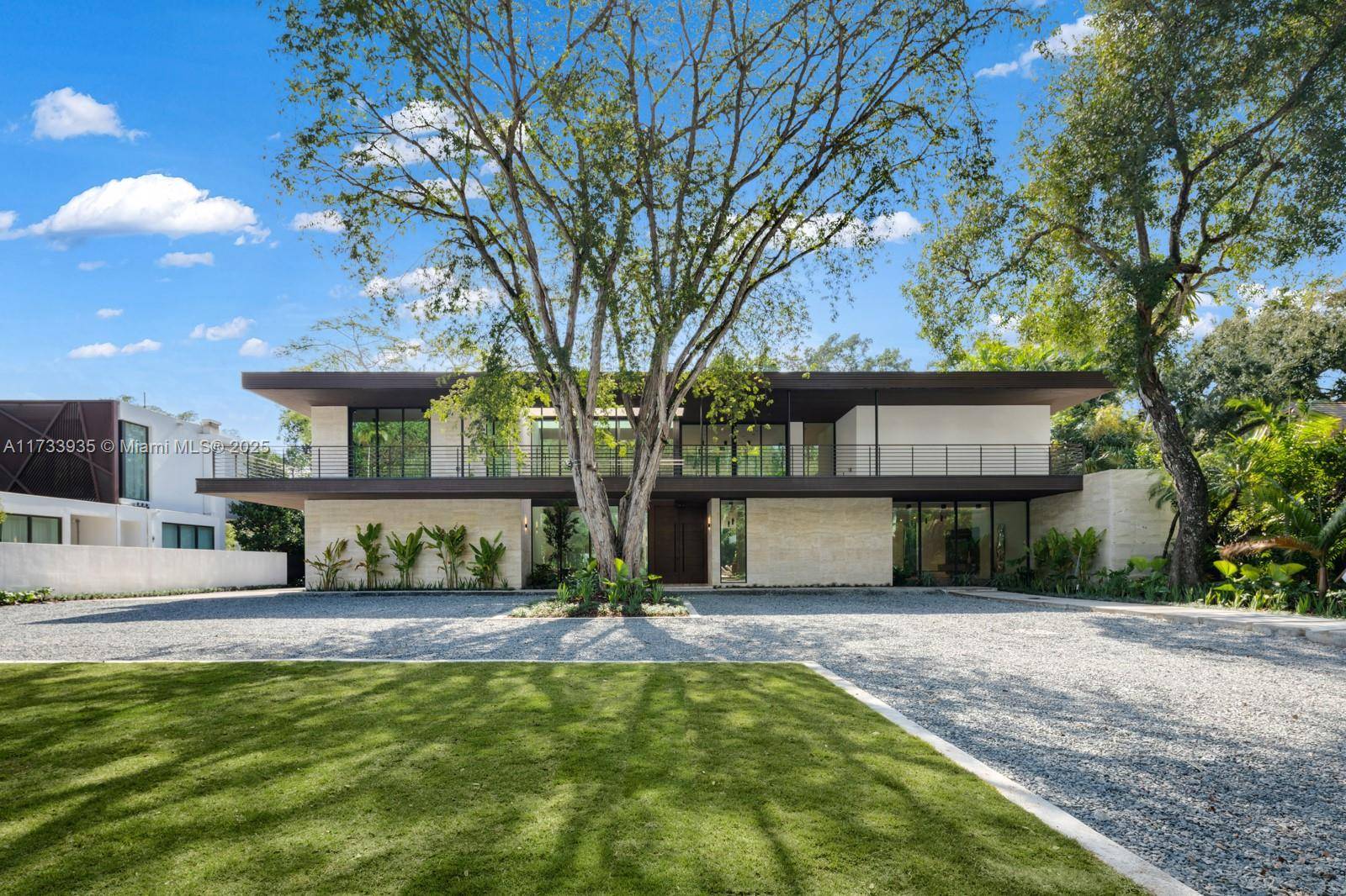 Elevate your expectations in this stunning contemporary masterpiece in the heart of Coconut Grove.