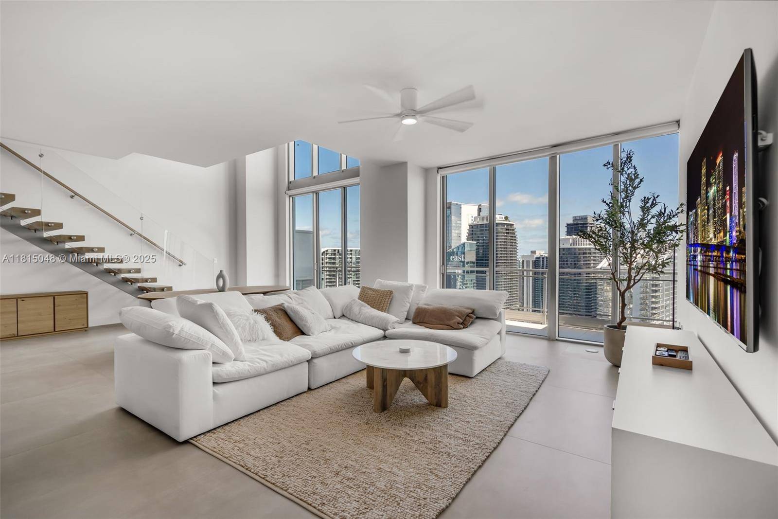 Welcome to the ultimate high rise masterpiece at Mint Miami a fully renovated sky mansion soaring from the 52nd floor !
