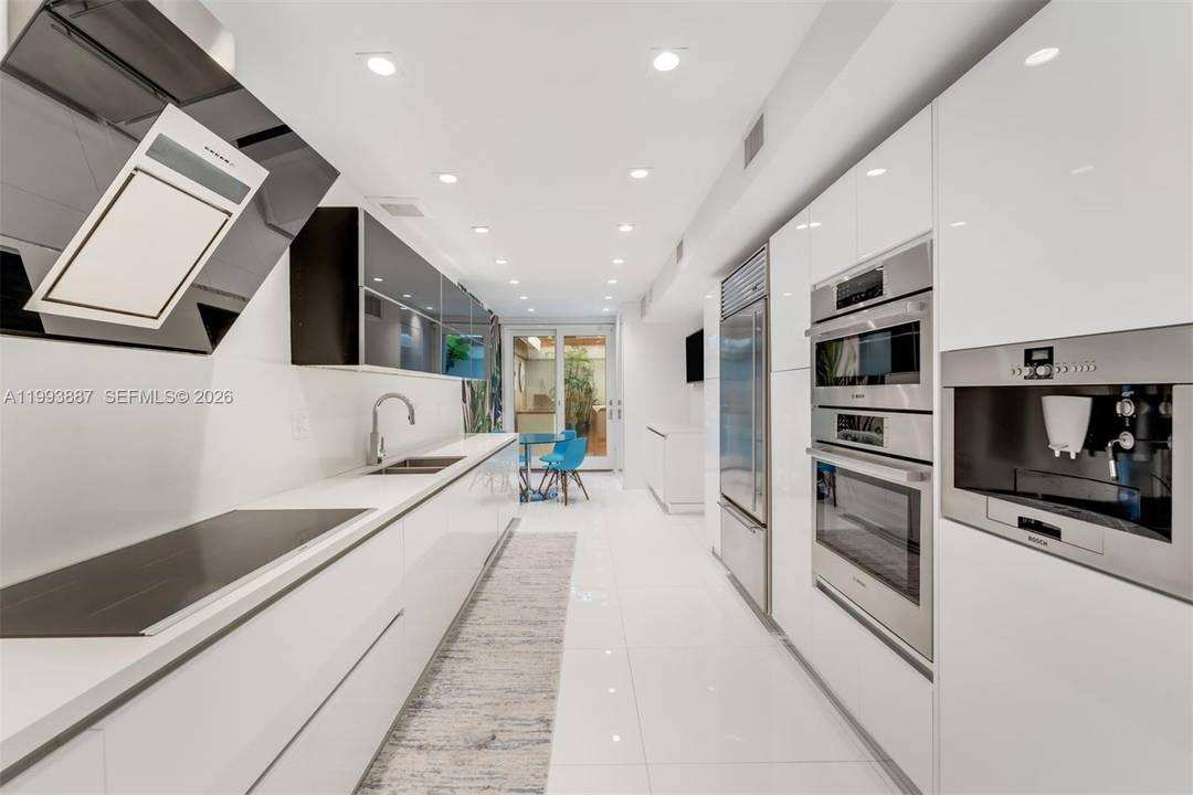 Stunning, fully renovated 3 story townhouse in the exclusive, guard gated Quayside community.