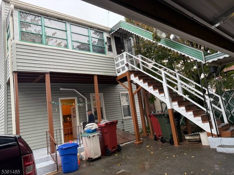 Welcome to this beautiful two family home, featuring a newly renovated living room that spans all floors, along with an additional new full bathroom in the basement.