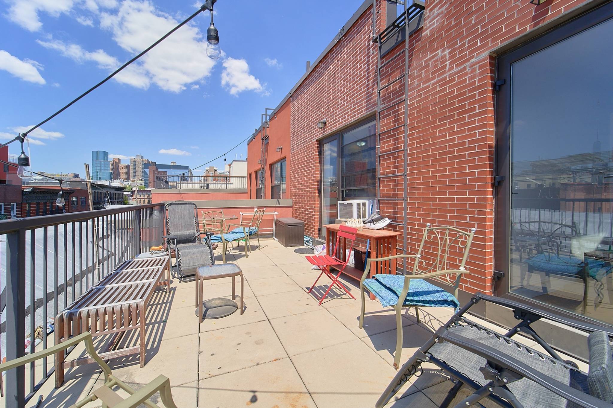 Top floor 4 bedroom, 2 full bathroom penthouse apartment with enormous outdoor space in the East Village !