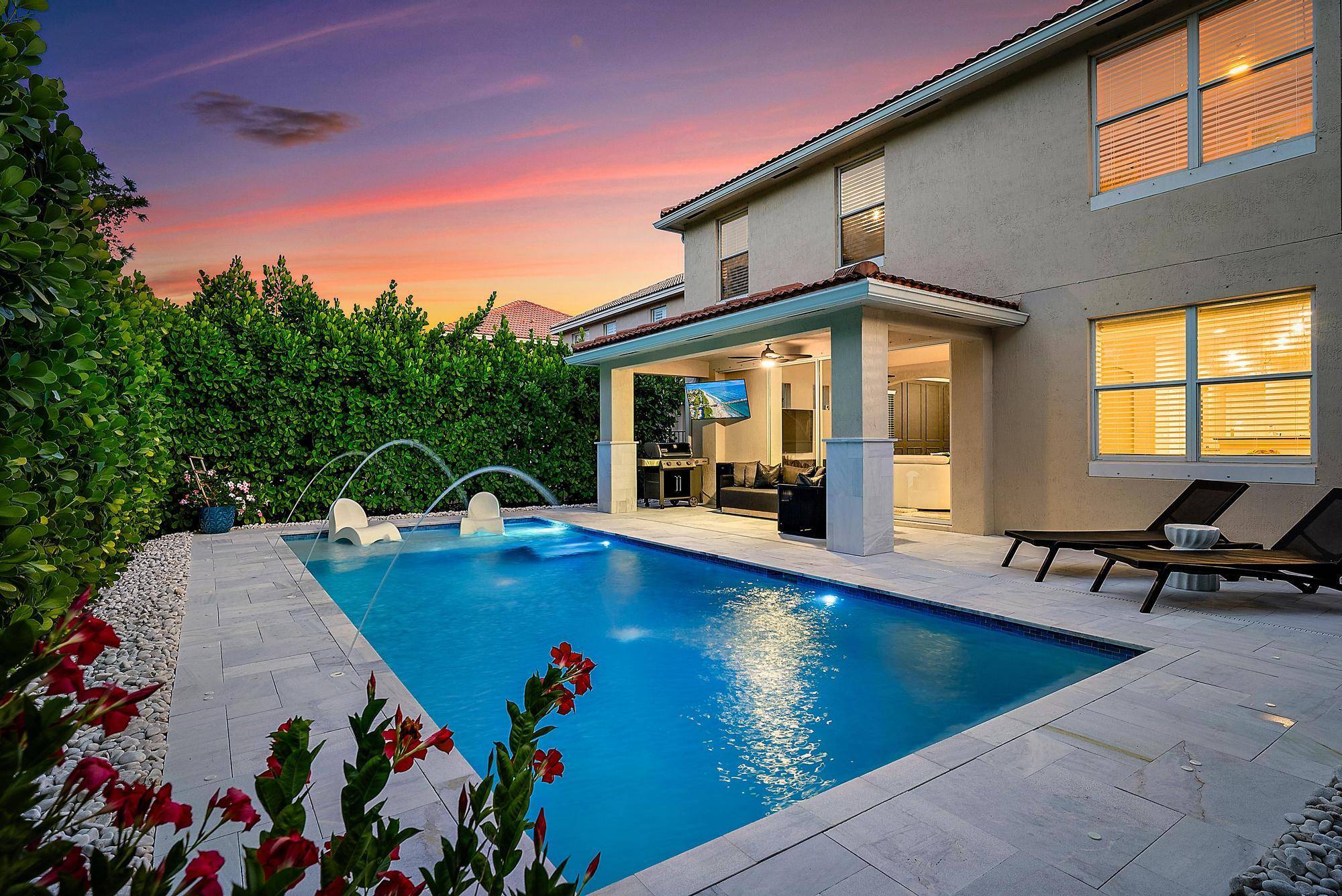 Rarely available and highly coveted Laguna model in the Oaks of Hobe Sound.