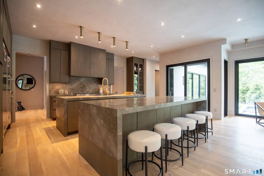 FrogPond Estate is a modern Scandinavian masterpiece unlike anything New Canaan has ever seen an architecturally rare achievement set on 2.