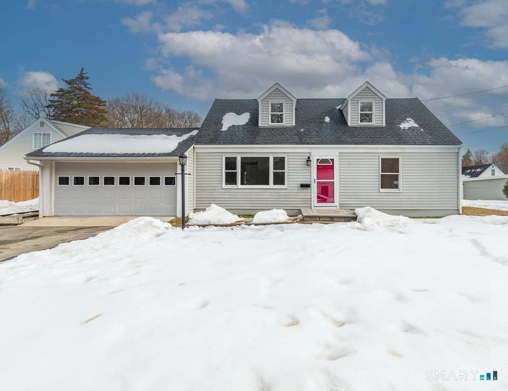 This thoughtfully renovated Cape Cod offers the perfect blend of classic charm and modern comfort.