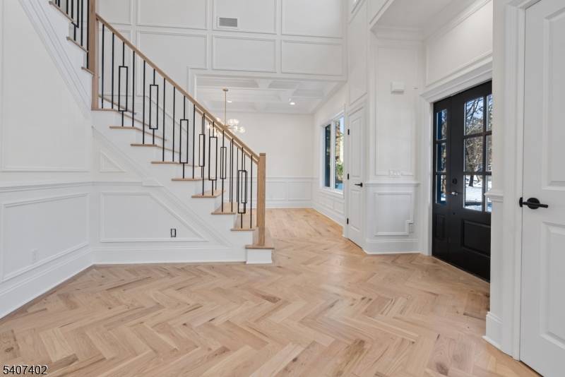 Set on an expansive lot of more than half an acre in the prestigious Riker Hill section, this custom built NEW construction home is a masterpiece of timeless elegance and ...