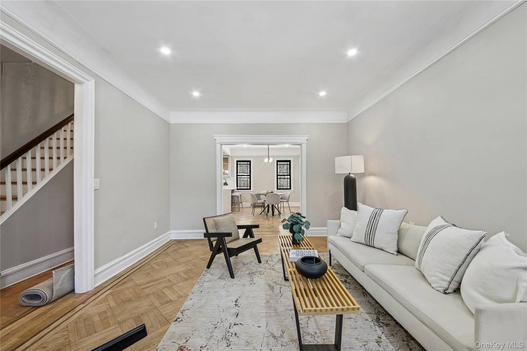 Welcome to this extra large single family home located on the border of Jackson Heights and East Elmhurst.