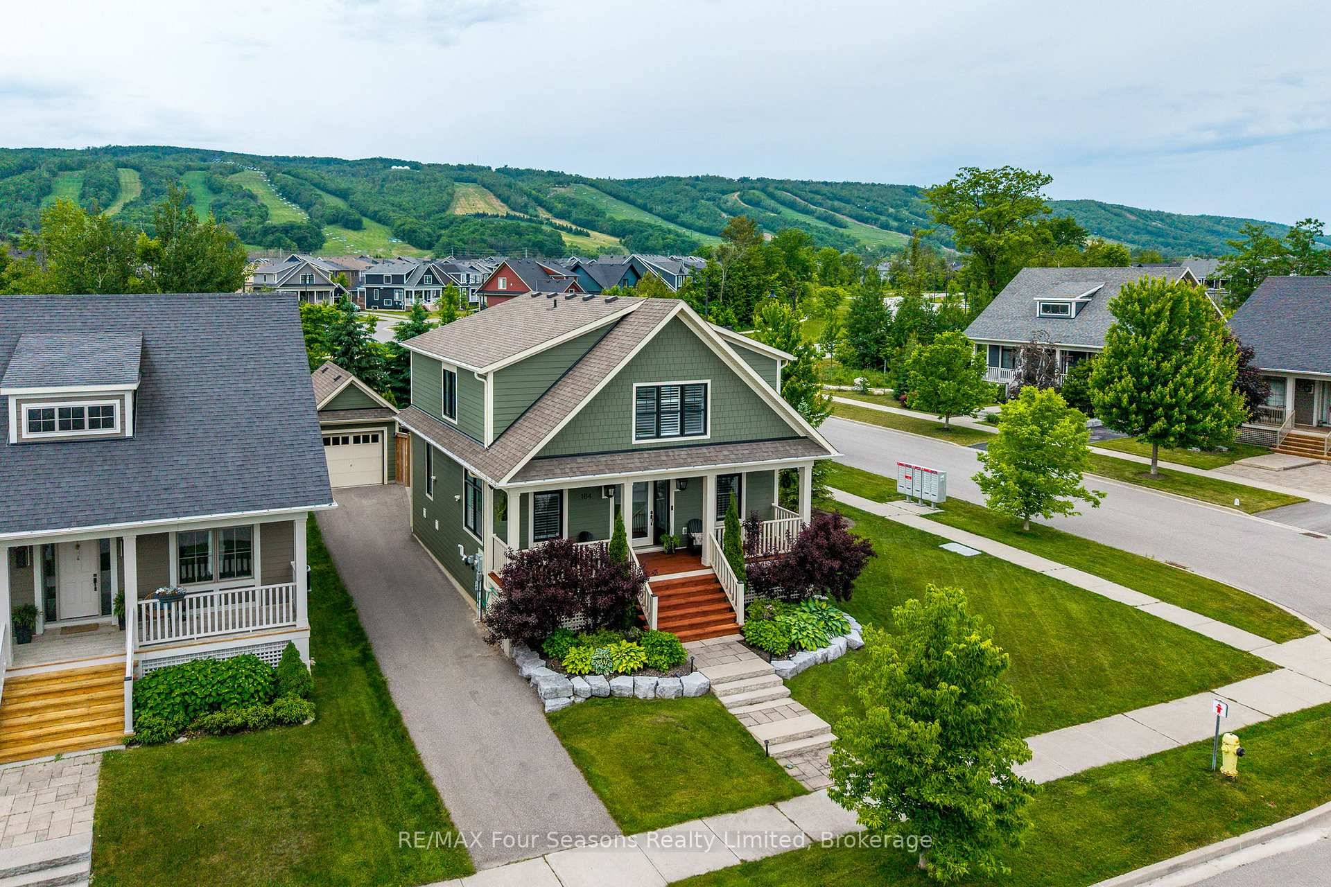 Welcome to this exceptional family home, ideally located in the exclusive first phase of Windfall the only phase featuring all detached homes.