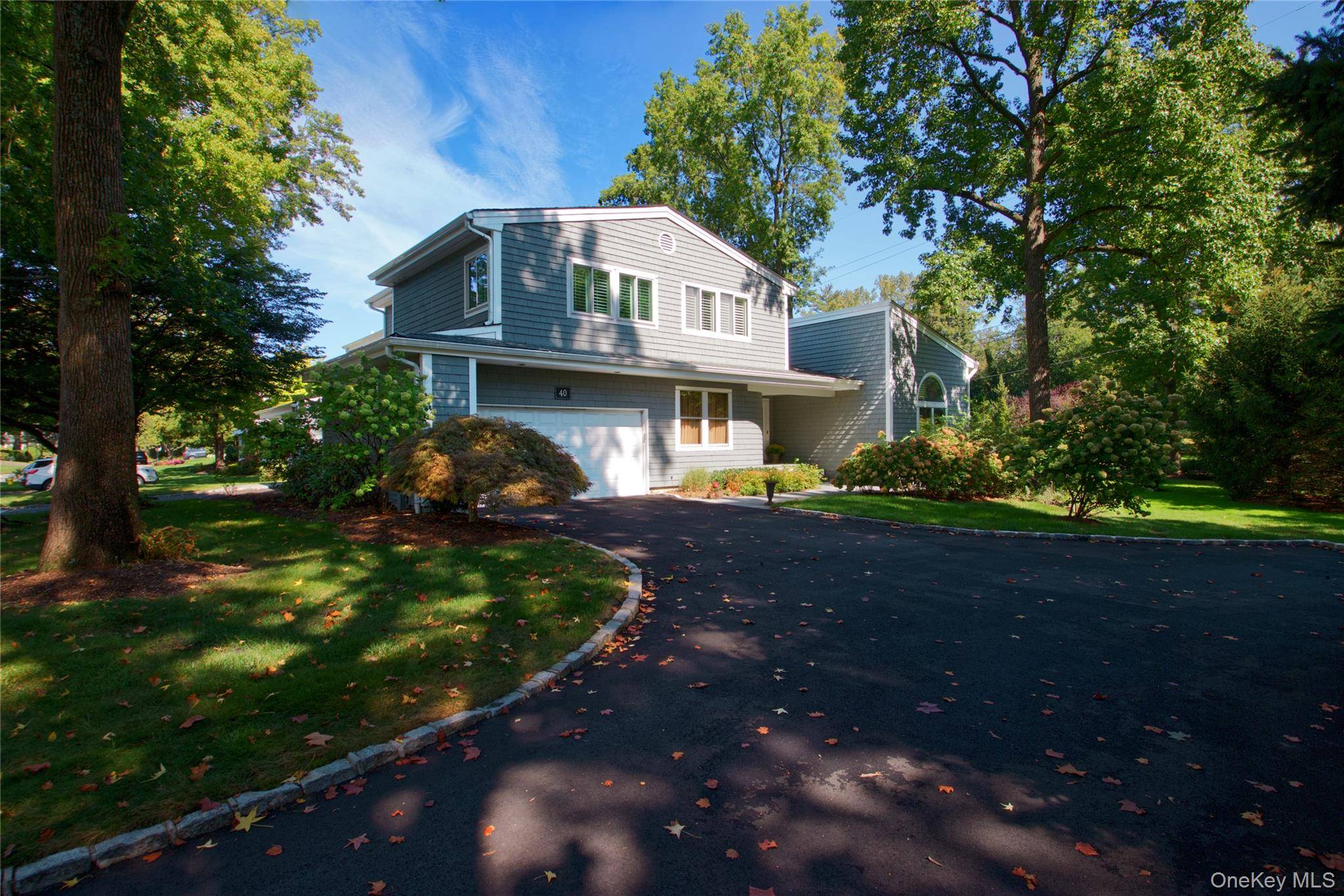 Welcome to this Elegant Ralph Lauren inspired end unit residence in the coveted Spruce Pond community of North Hills.