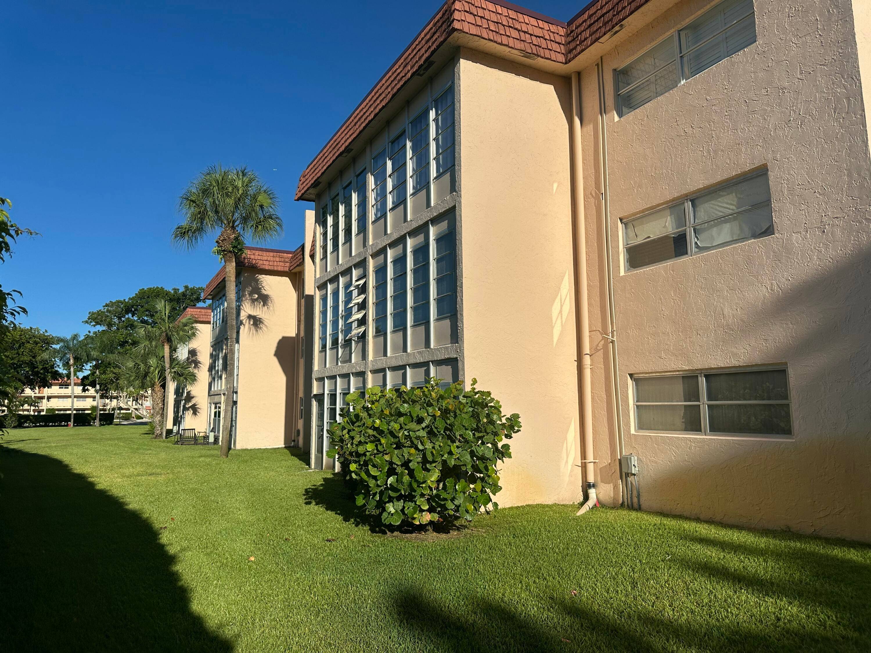 Corner 2nd floor 2 bedroom, 2 bath condo at Villages of Oriole, Bonaire, Delray Beach with garden views.