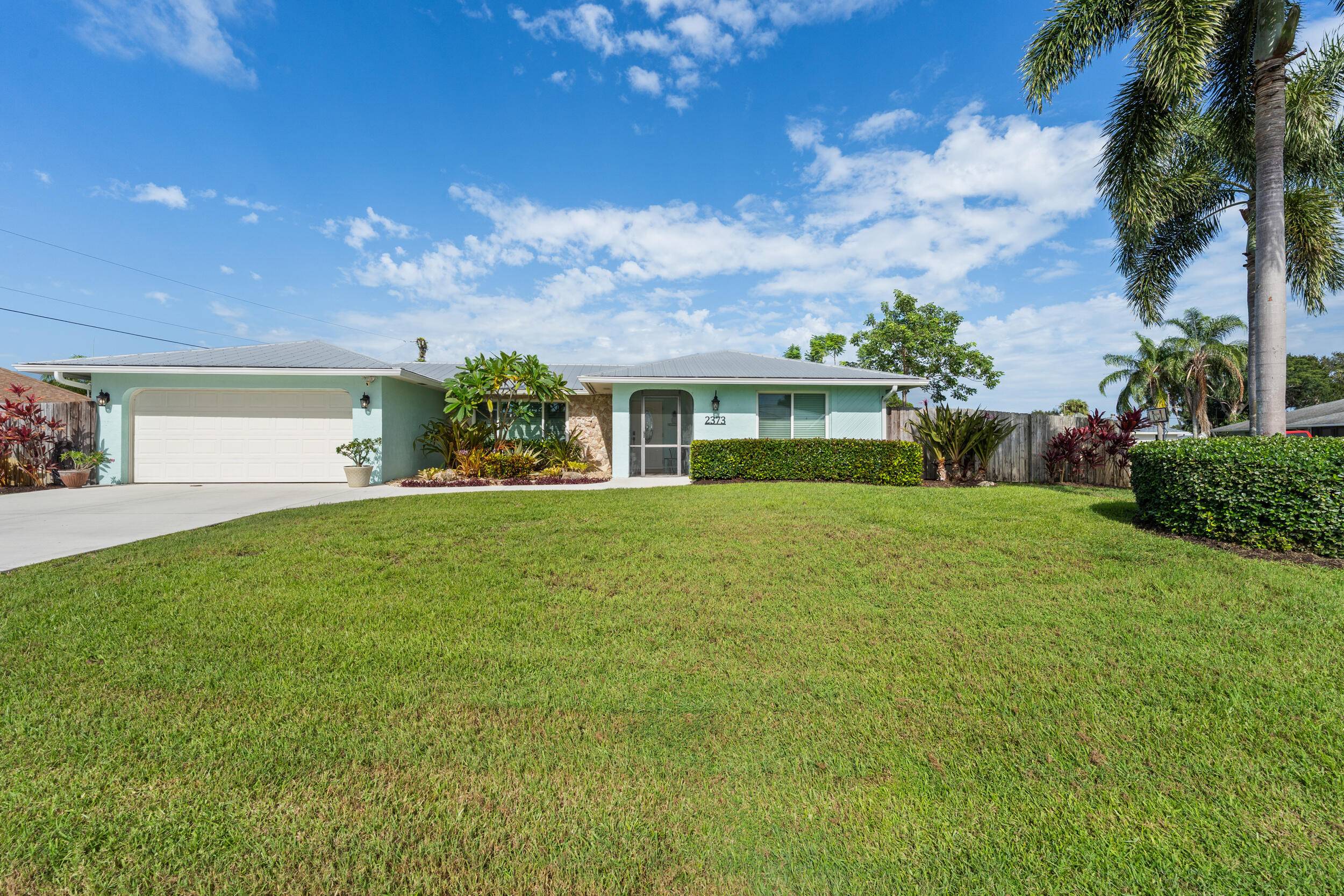 Welcome to this charming 3BR 2BA pool home on a corner, fenced in lot in the heart of Port St.