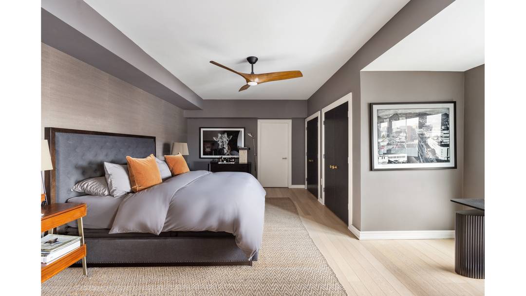 A stunning, sun filled penthouse with open views and an ideal layout.