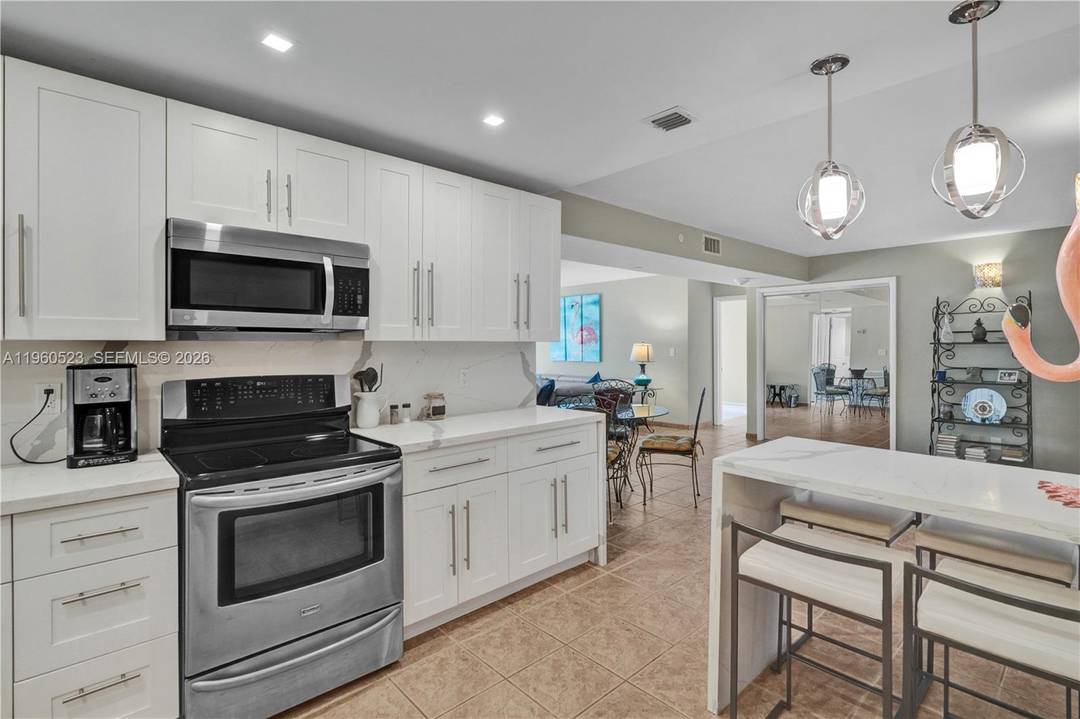 Charming 2 bedroom 2 bath unit at the Admiralty in Bal Harbour, a co op within walking distance of Bal Harbour Shoppes and across the street from the ocean.