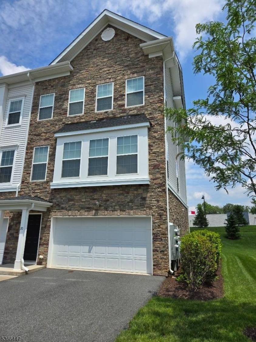 Located in one of the most sought after areas in town, this desirable end unit offers both charm and convenience.