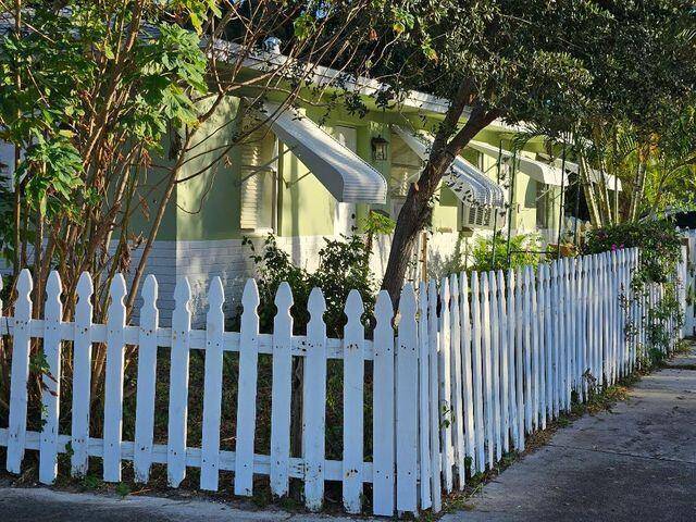 CONCRETE BLOCK STRUCTURE ZONED DUPLEX CURRENTLY RENTED BOTH SIDE, WITH ONE BEDROOM ONE BATH ON EACH SIDE.