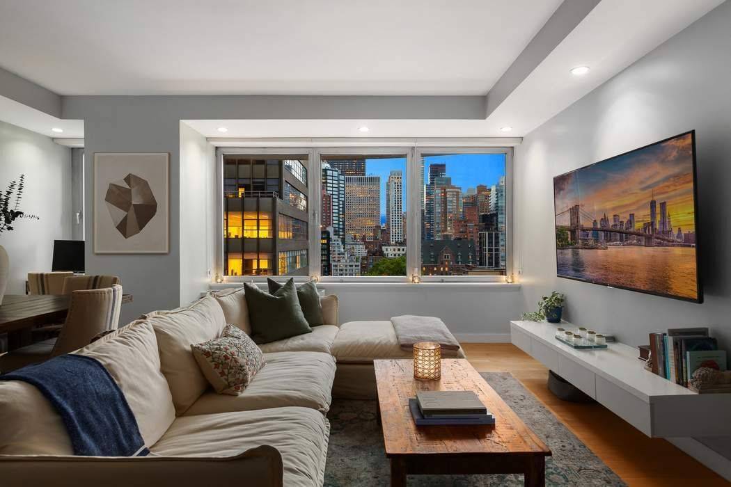 Welcome to Residence 12A at The Octavia a meticulously renovated, turnkey 1 bedroom, 1.