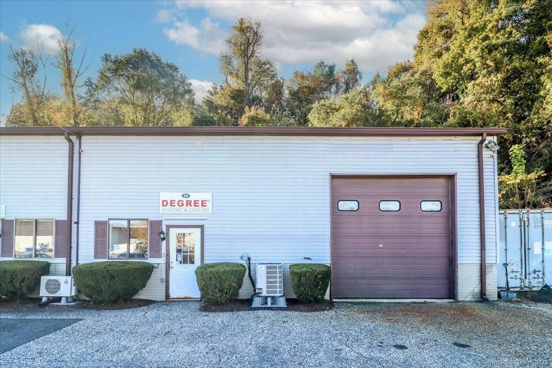 Exceptional opportunity to own a versatile industrial condo located in the desirable South End Plaza.