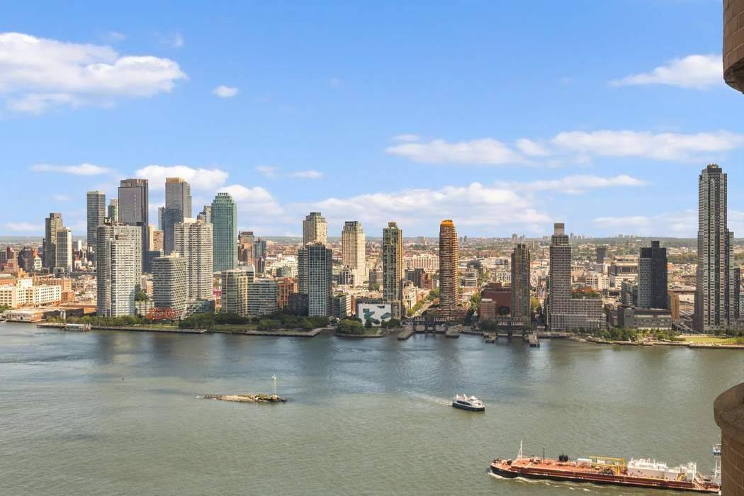 Coveted E Line Panoramic 270 Views Luxury Condo at The Corinthian Experience breathtaking south, west, and north exposures from this rare corner split two bedroom, two bath condominium perched on ...