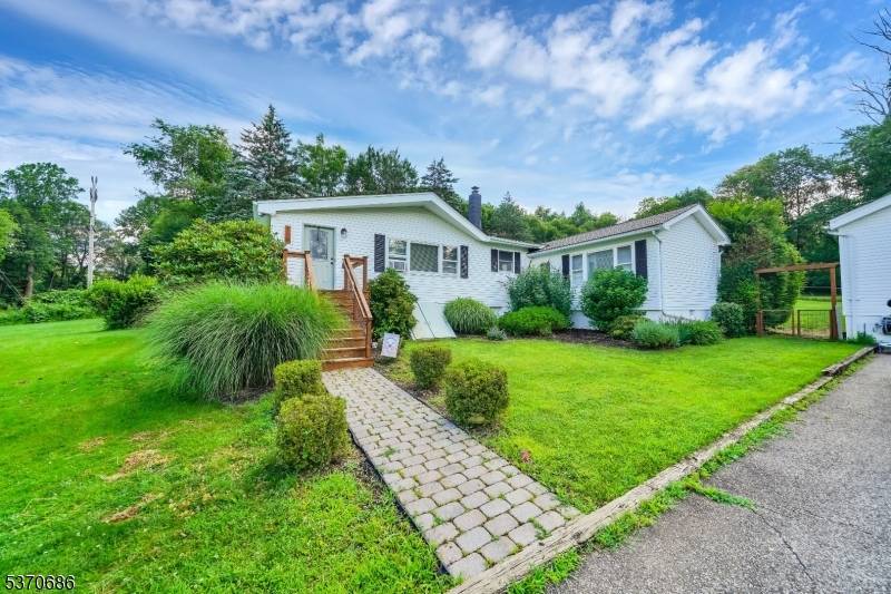 Your search ends here ! This 3 bedroom, 2 bathroom ranch is nestled on just under 1 acre, and features many updates throughout !