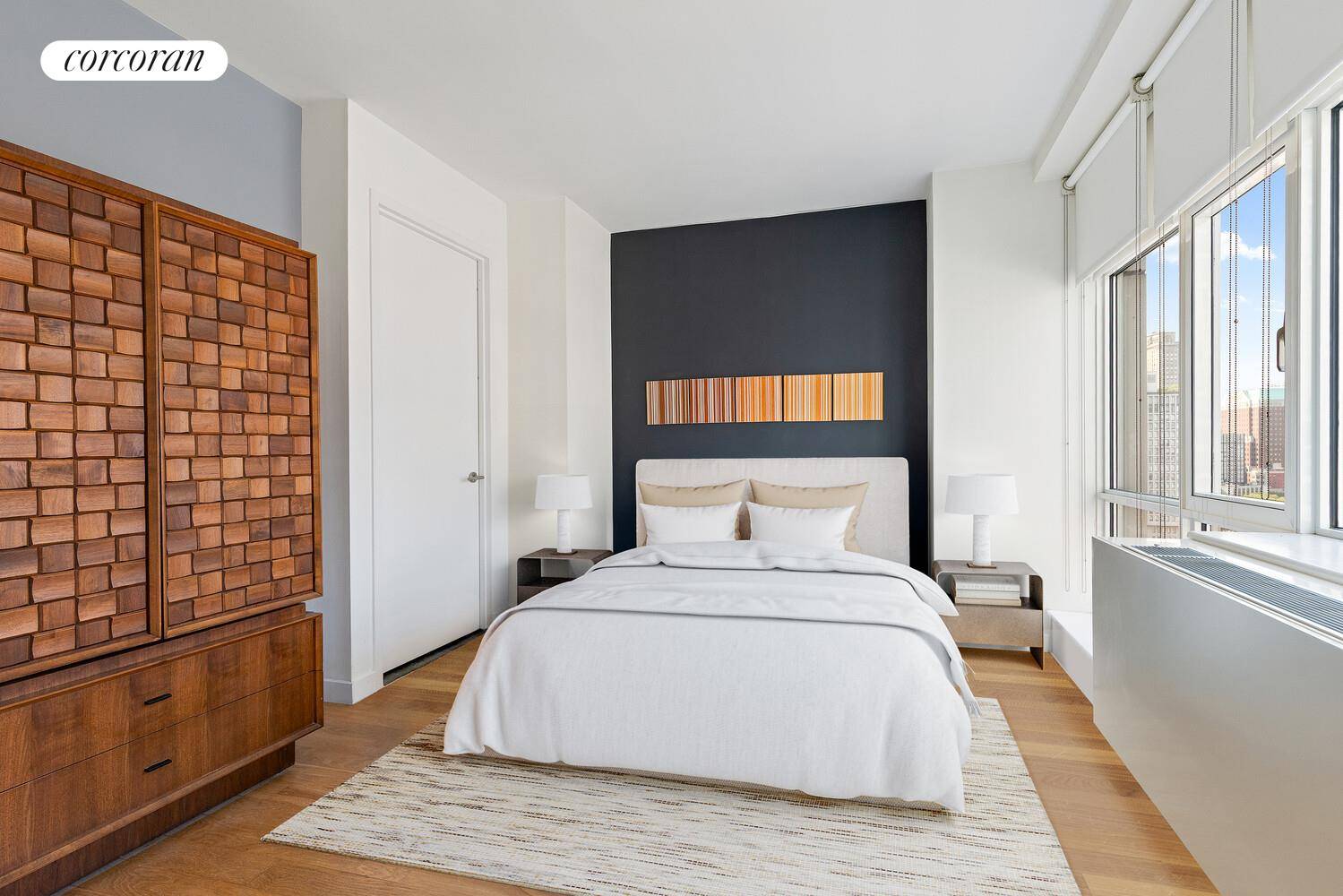 Perched high above the vibrant streets of Downtown Brooklyn, The Syndicate Team presents this luminous two bedroom, two bath residence ; a modern sanctuary where sleek design meets urban convenience.