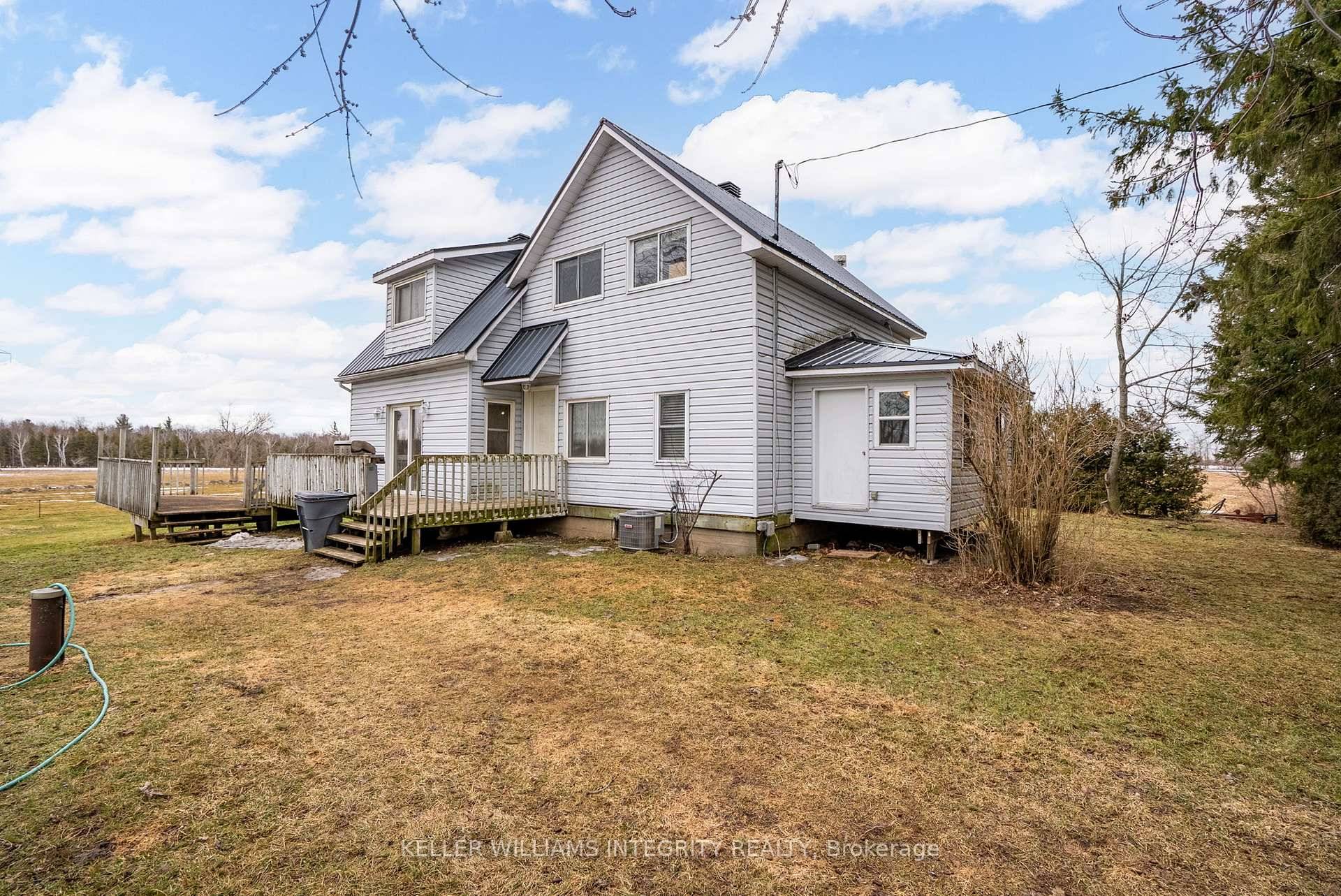 This farmhouse built in 1890 is nestled on 21.