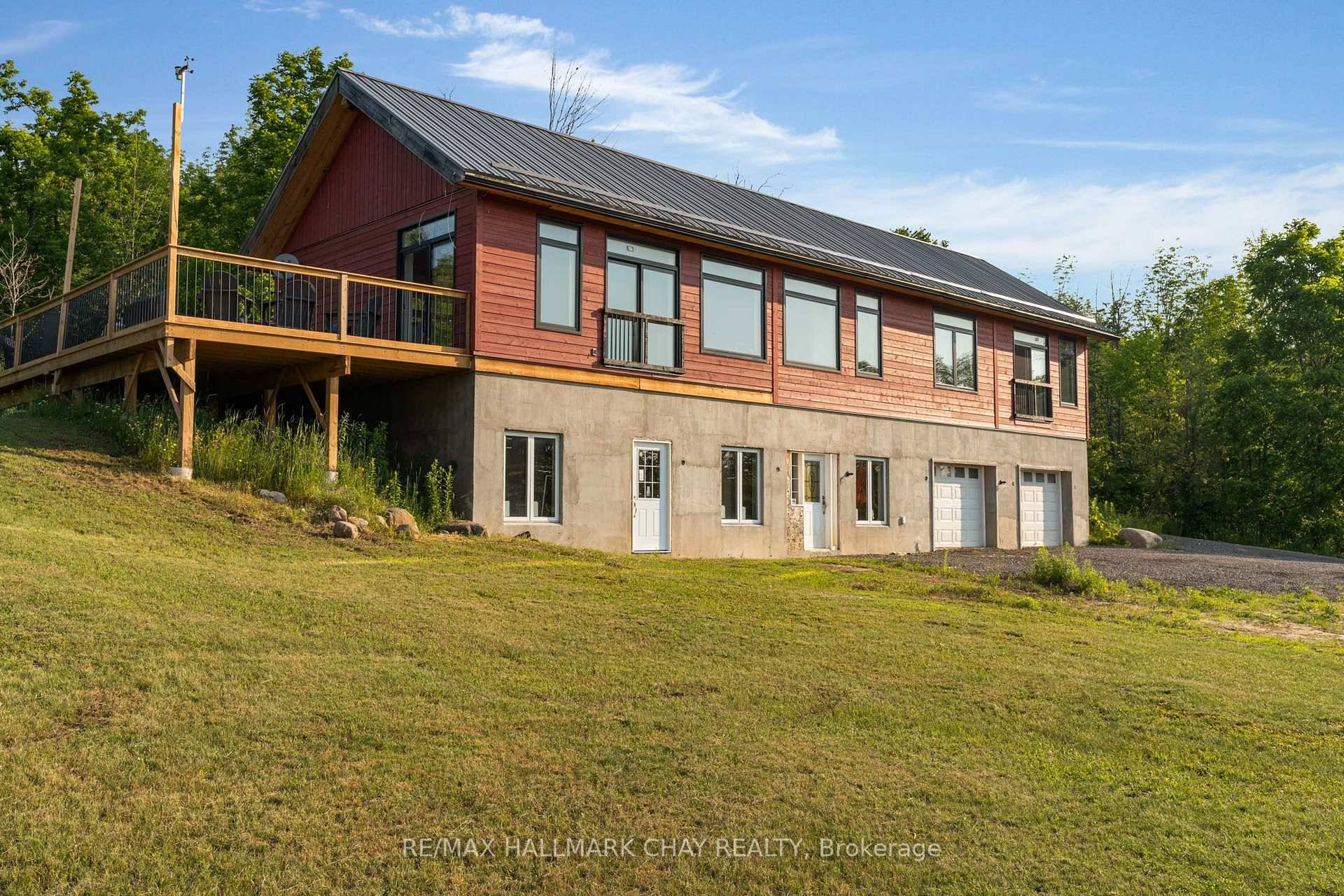 Welcome to an extraordinary opportunity just moments from the charming village of Creemore's downtown.