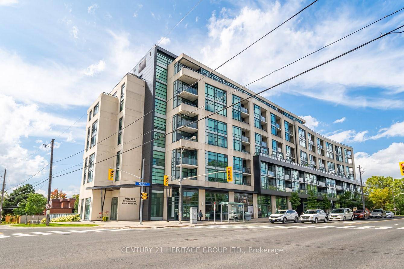 Welcome to Vista Condos. Sun filled corner unit with 2 walk outs to private patio with unobstructed South East views !