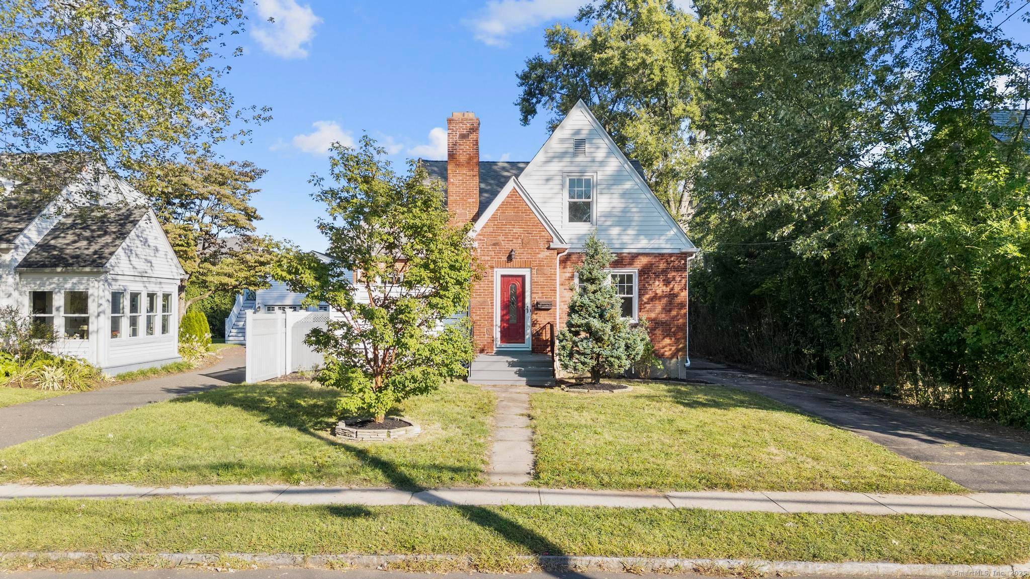 SOLAR IS OWNED OUTRIGHT. Discover this charming expanded Cape style home nestled on a beautifully landscaped lot in a highly desirable neighborhood of West Hartford.