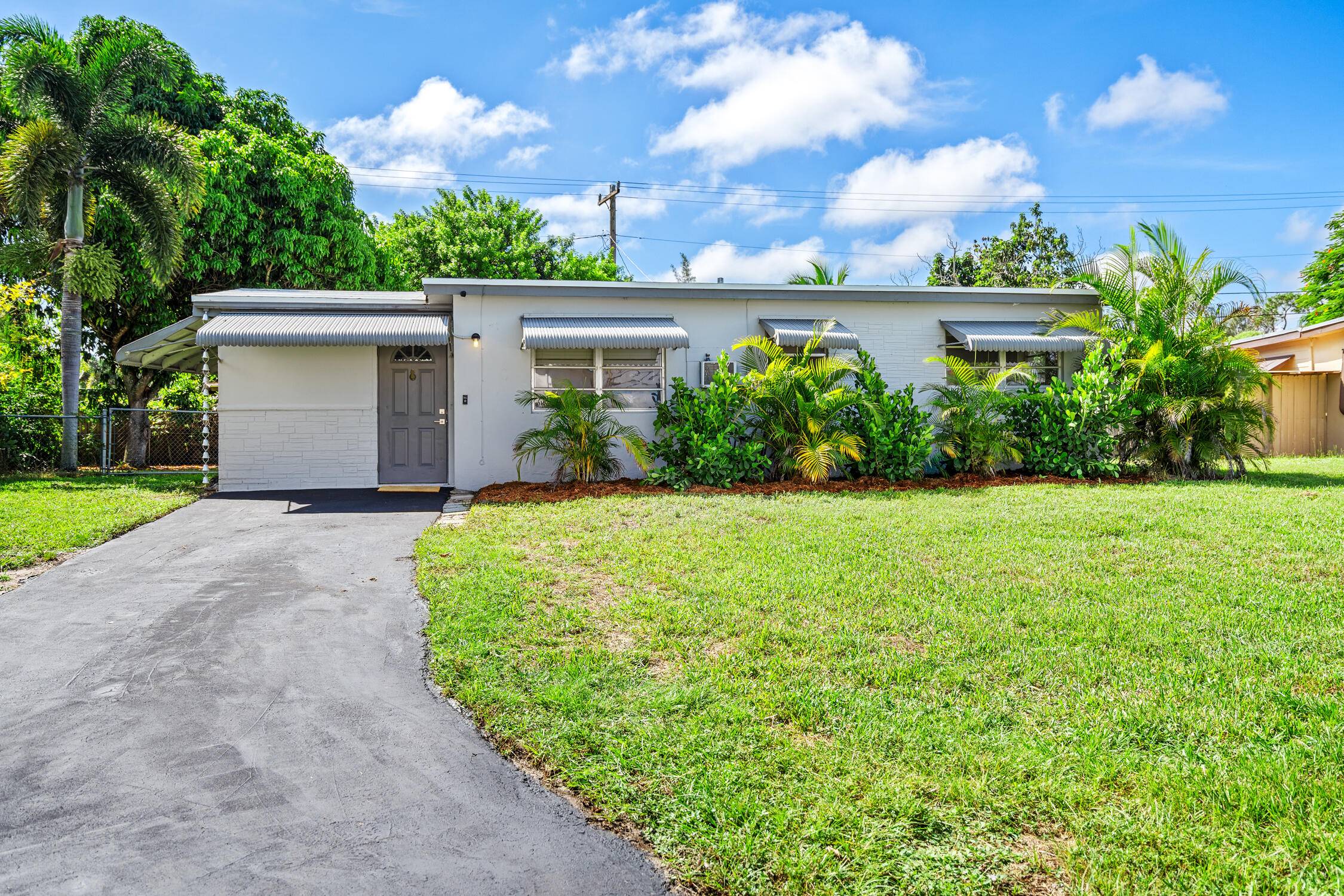 Welcome to a newly renovated 3 bedroom, 1 bath home with a versatile den and BRAND NEW ROOF on the main house.
