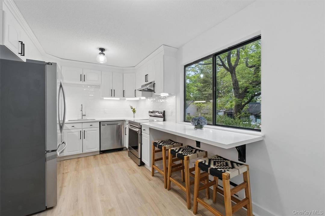 Highly desired Katonah model set in a serene location with absolute privacy.