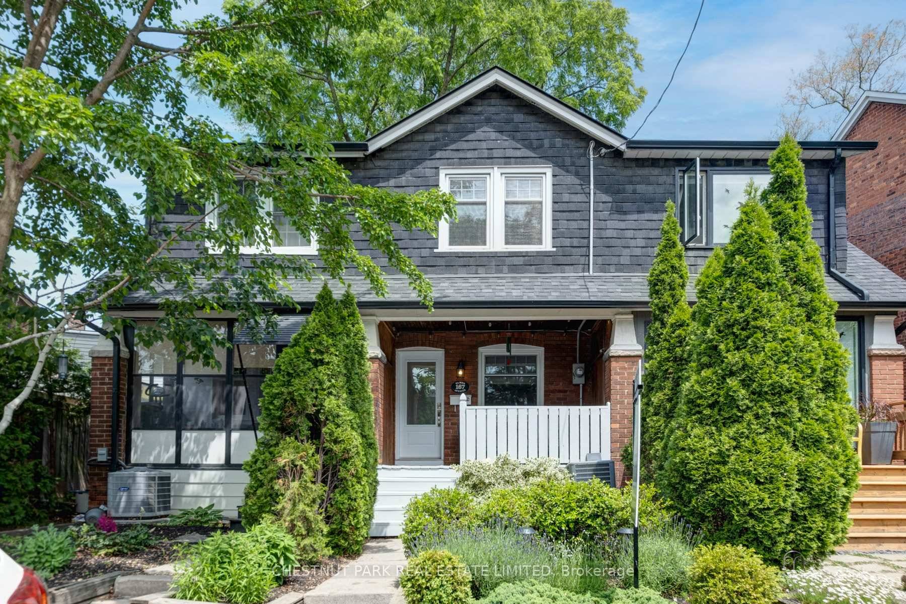 Wonderful opportunity to live in the Beaches in this charming updated home with a detached garage !