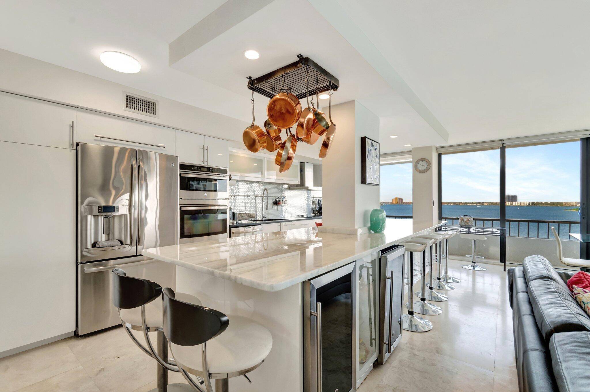 57 FOOT WRAP AROUND BALCONY WITH UNOBSTRUCTED VIEWS OF THE BLUE ATLANTIC OCEAN, INTRA COASTAL WATERWAYS AND JOHN MACARTHUR BEACH STATE PARK.