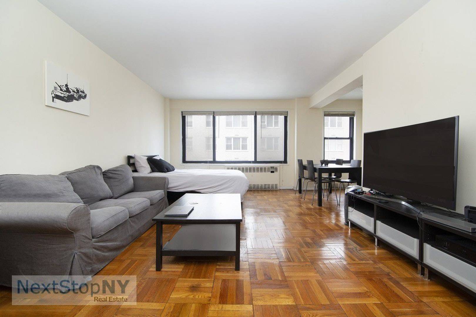 Sponsor Unit ! Tucked away in the bustling heart of Murray Hill, this well maintained alcove studio offers an unmatched living experience bathed in natural light.