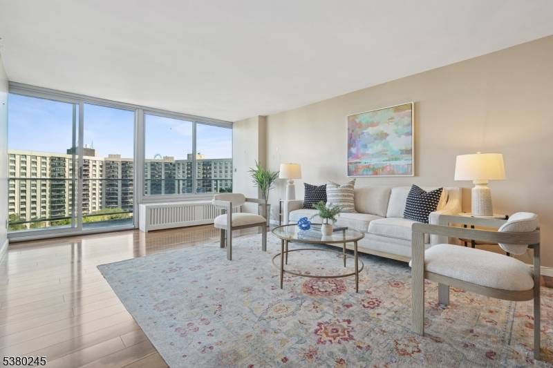 From sunrise to sunset, your backdrop in this 10th floor, one bedroom condo is nothing short of spectacular !