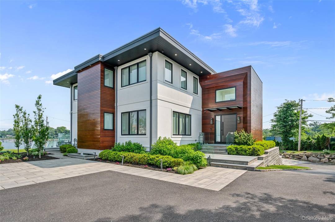 70 Candy Lane is a one of a kind waterfront mansion located in the prestigious Saddle Rock community of Great Neck.