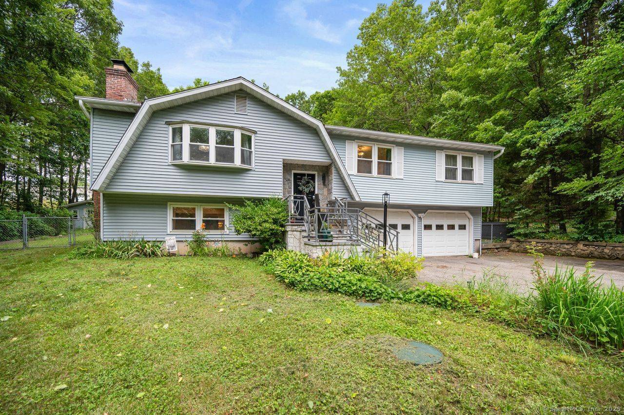 Welcome home to this turn key entertainers dream in highly desirable Middlebury CT.