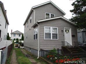 4 Bedroom 2 full bath home located in a mid block location.