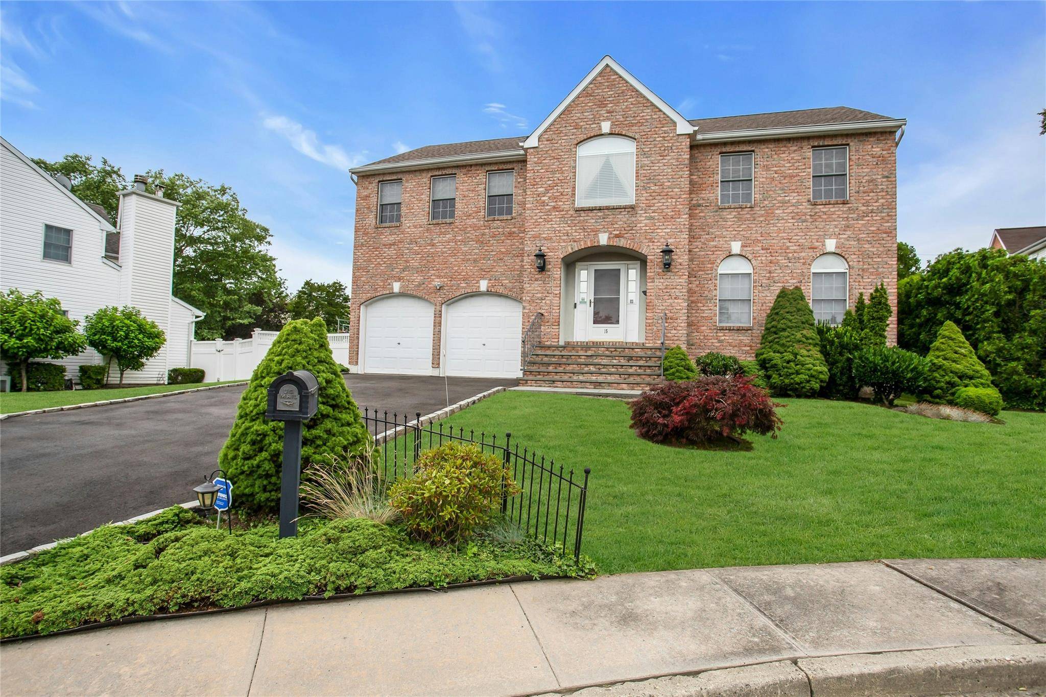 Welcome to this picture perfect Colonial, nestled in a tranquil cul de sac, offering 4 generous bedrooms and 2.
