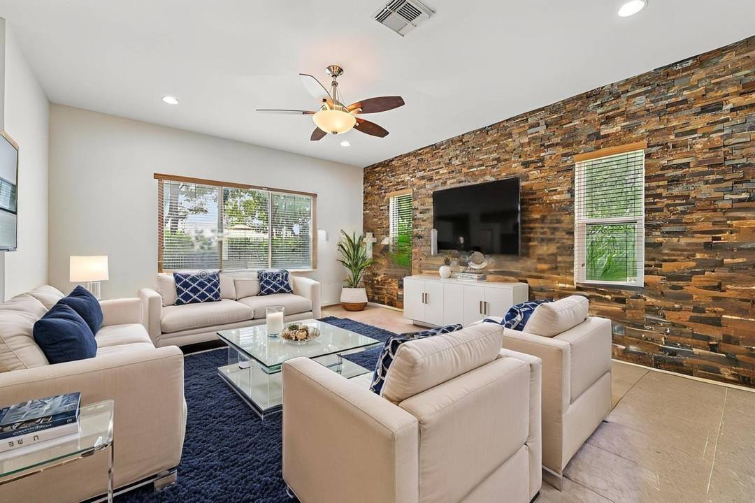 Welcome to this beautifully maintained 5 bedroom, 3 and a half bathroom pool home perfectly situated on one of the largest and most private lots in the highly sought after ...