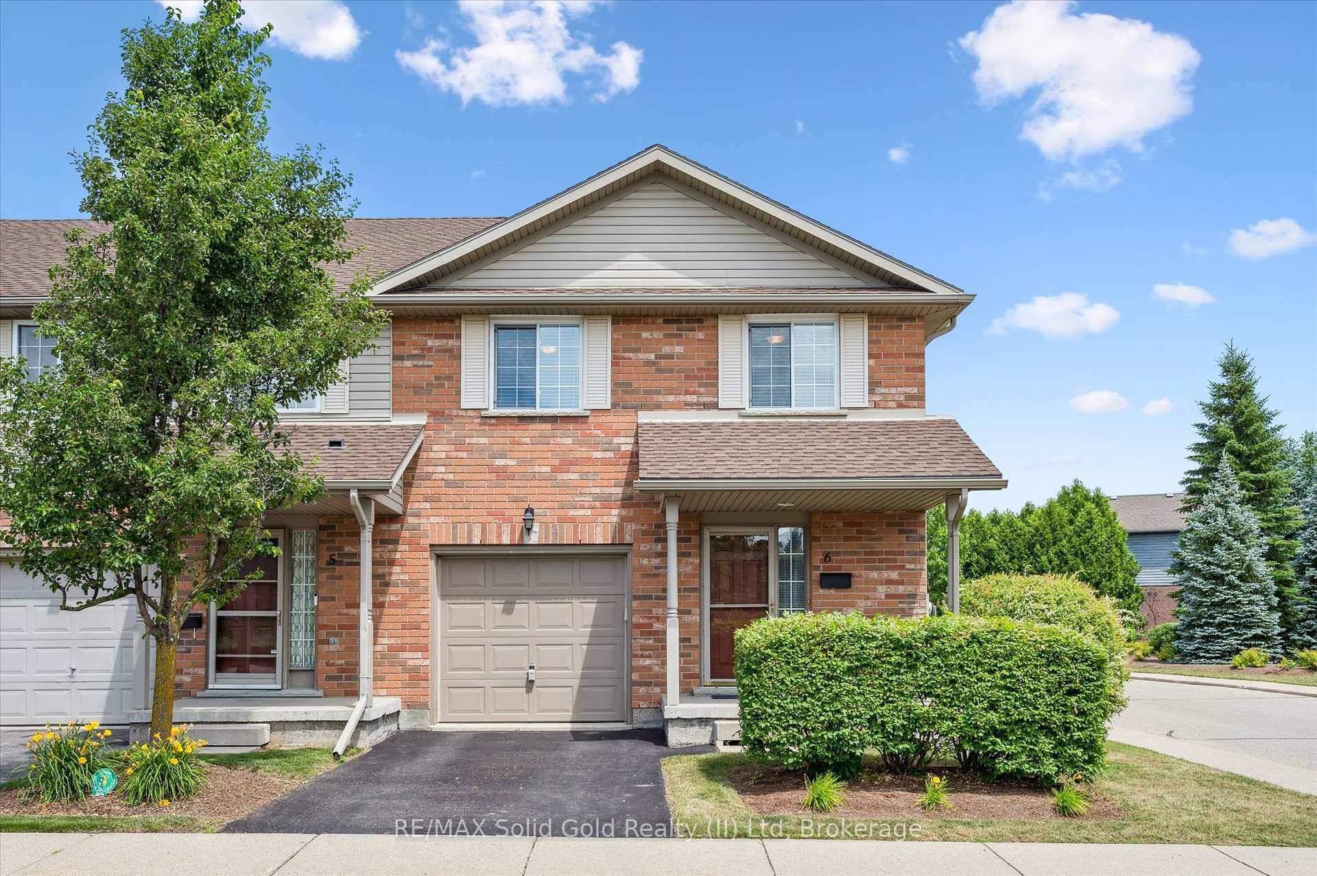 This bright, beautifully updated amp ; FRESHLY PAINTED END UNIT townhome offers stylish, carpet free living throughout.