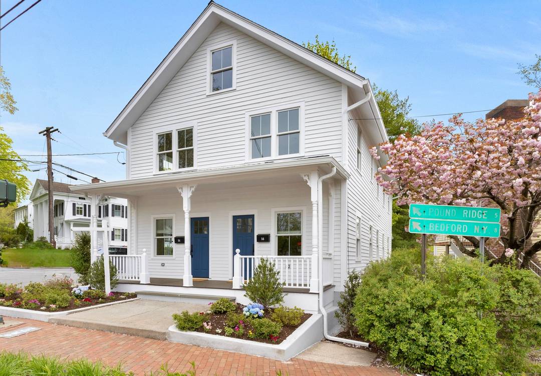 This bright and airy two bedroom duplex spans two levels and offers picturesque views of Main Street.