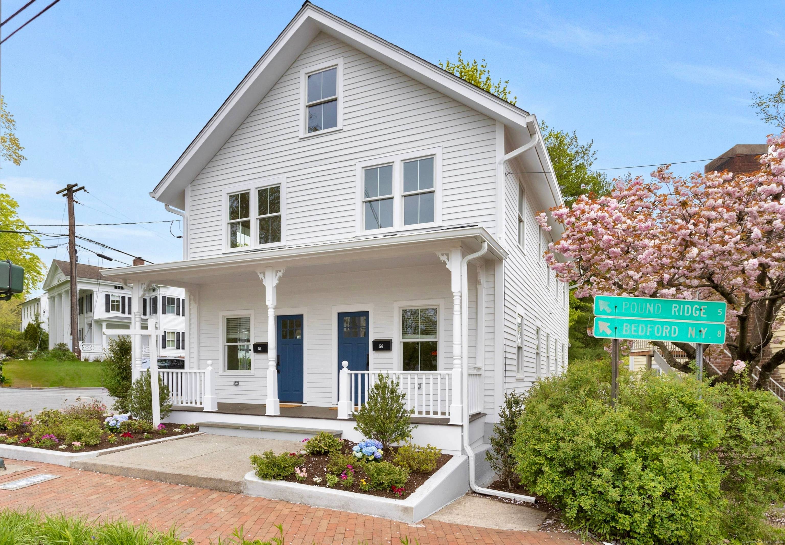 This bright and airy two bedroom duplex spans two levels and offers picturesque views of Main Street.