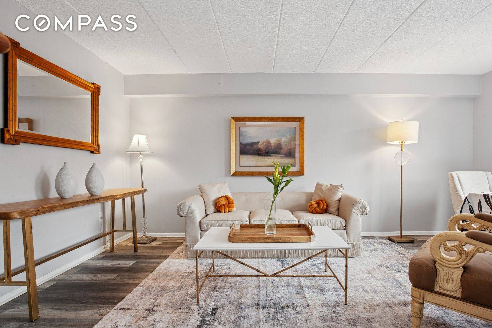 This beautifully refreshed two bedroom, one and a half bathroom duplex in the St.