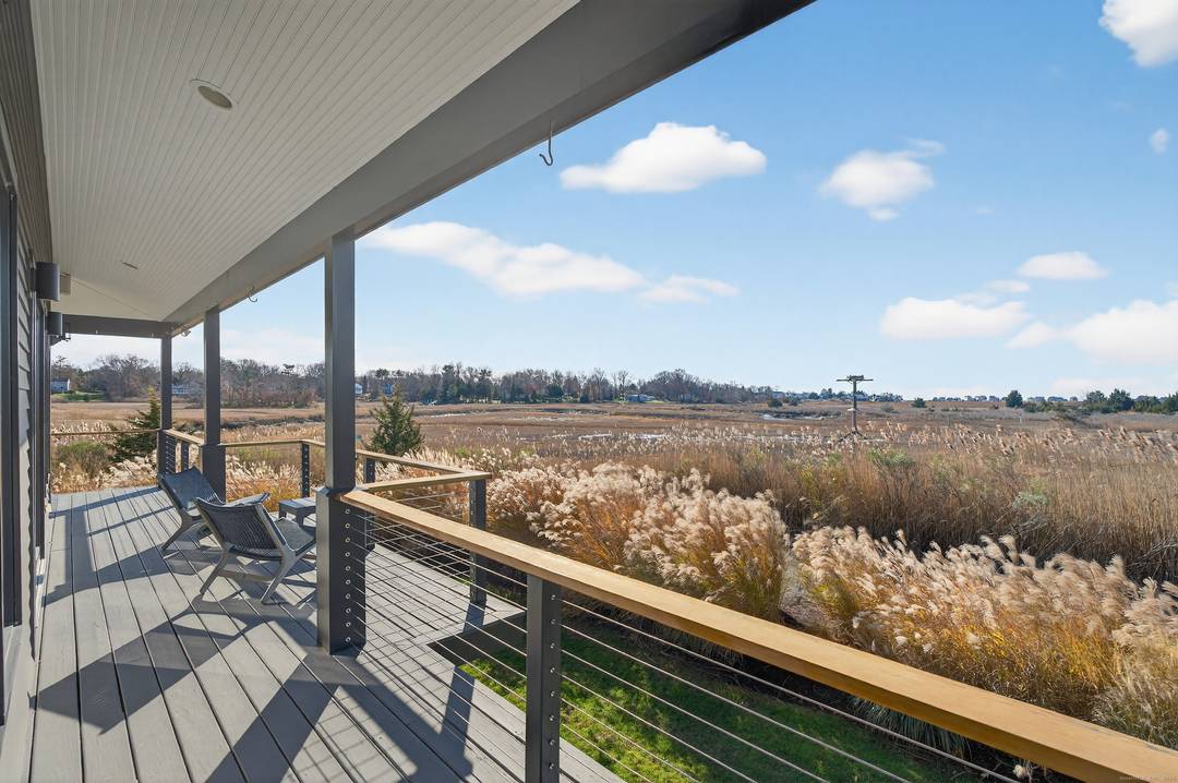Prepare to be captivated by this sun soaked, updated contemporary waterfront home offering breathtaking 180 degree views of the magnificent salt marsh, the serene Neck River, and the sparkling Long ...