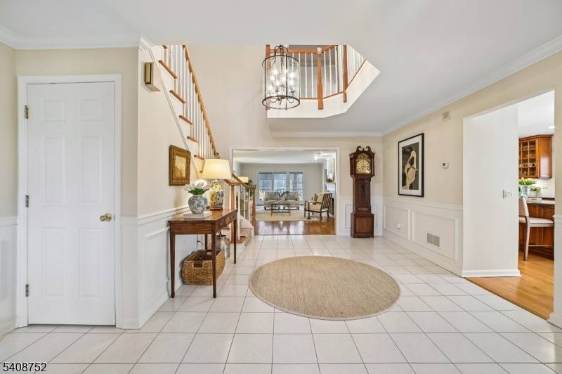 Welcome to this renovated Taylor model end unit townhome in the prestigious Moore Estate.