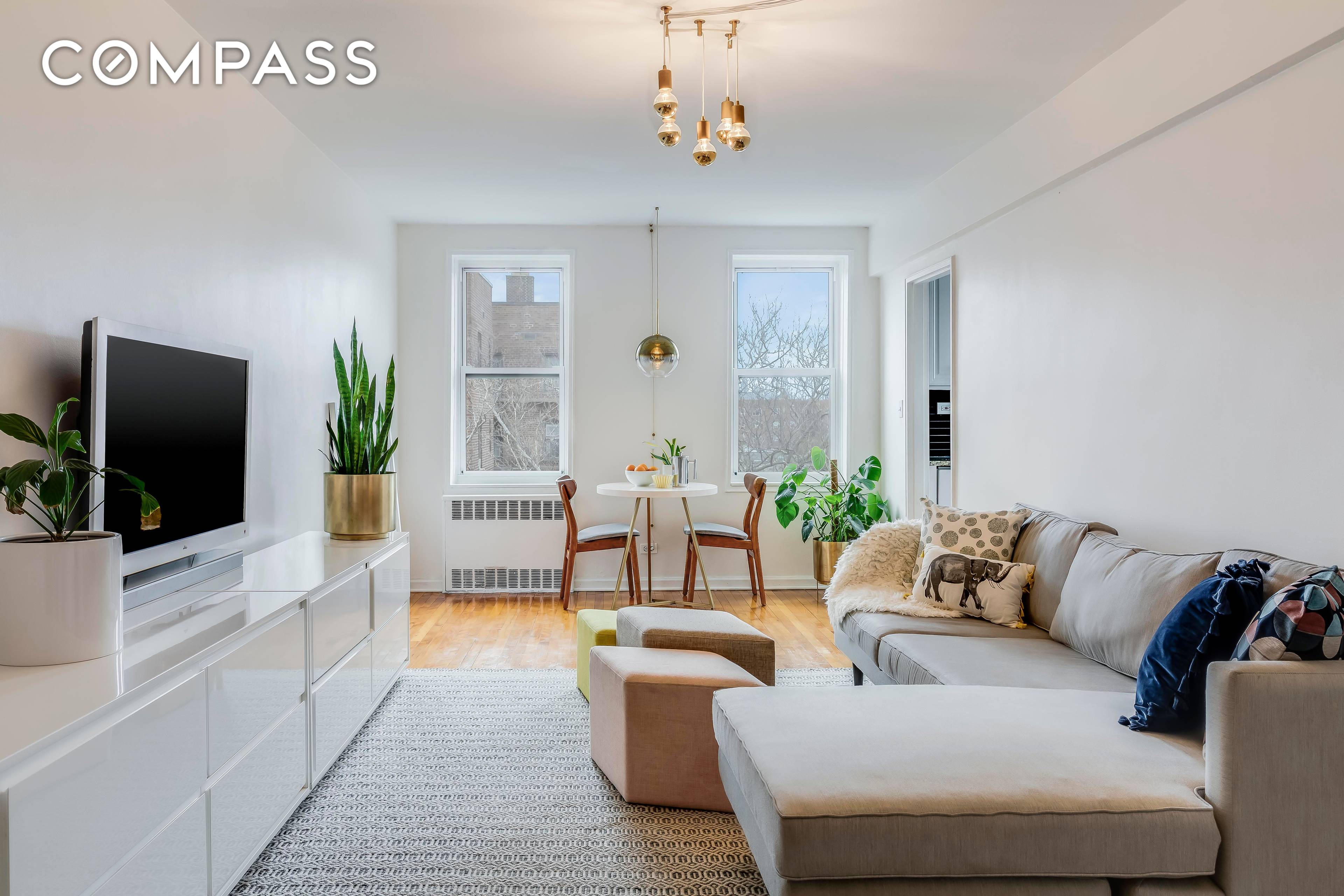New to market Bright, corner 2 bedroom coop in the heart of Jackson Heights !