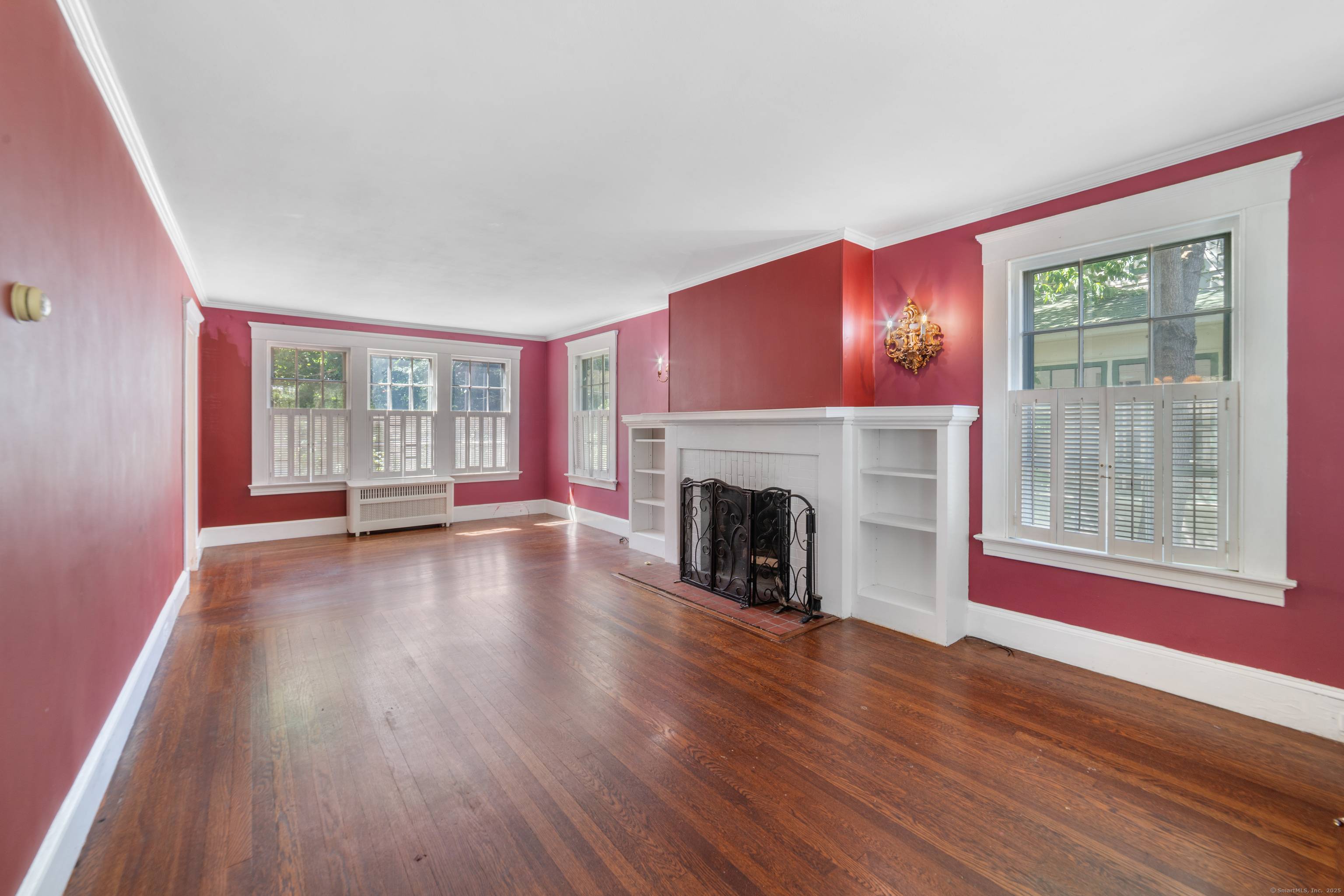 Welcome to this Spring Glen sunlit 1920's Colonial where timeless charm meets modern comfort.