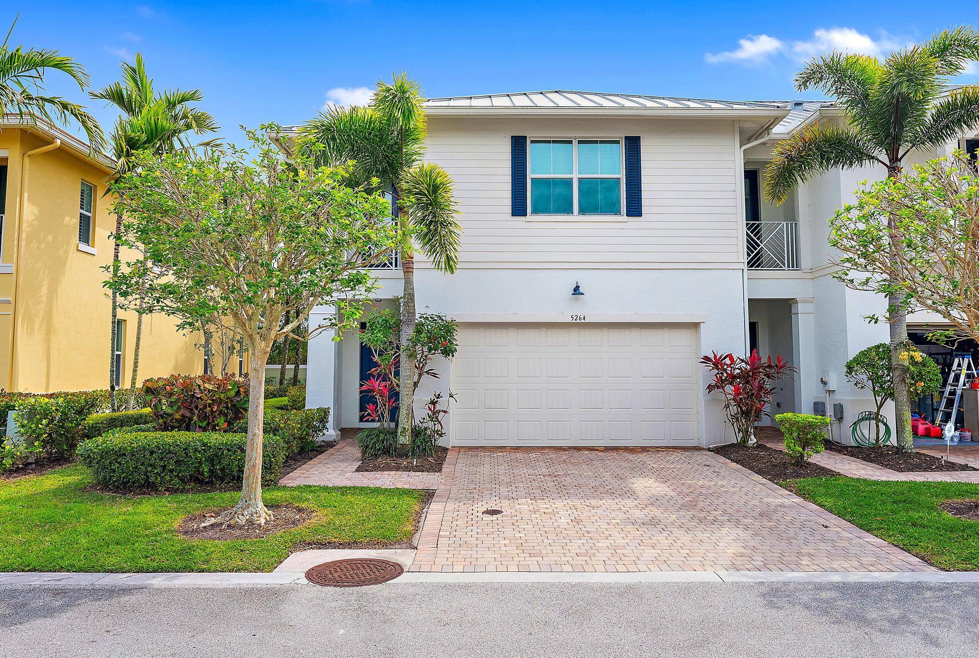 This 3 bedroom, 2. 5 bath, 2 car garage corner unit offers an open concept floor plan with ALL impact glass plenty of natural light.