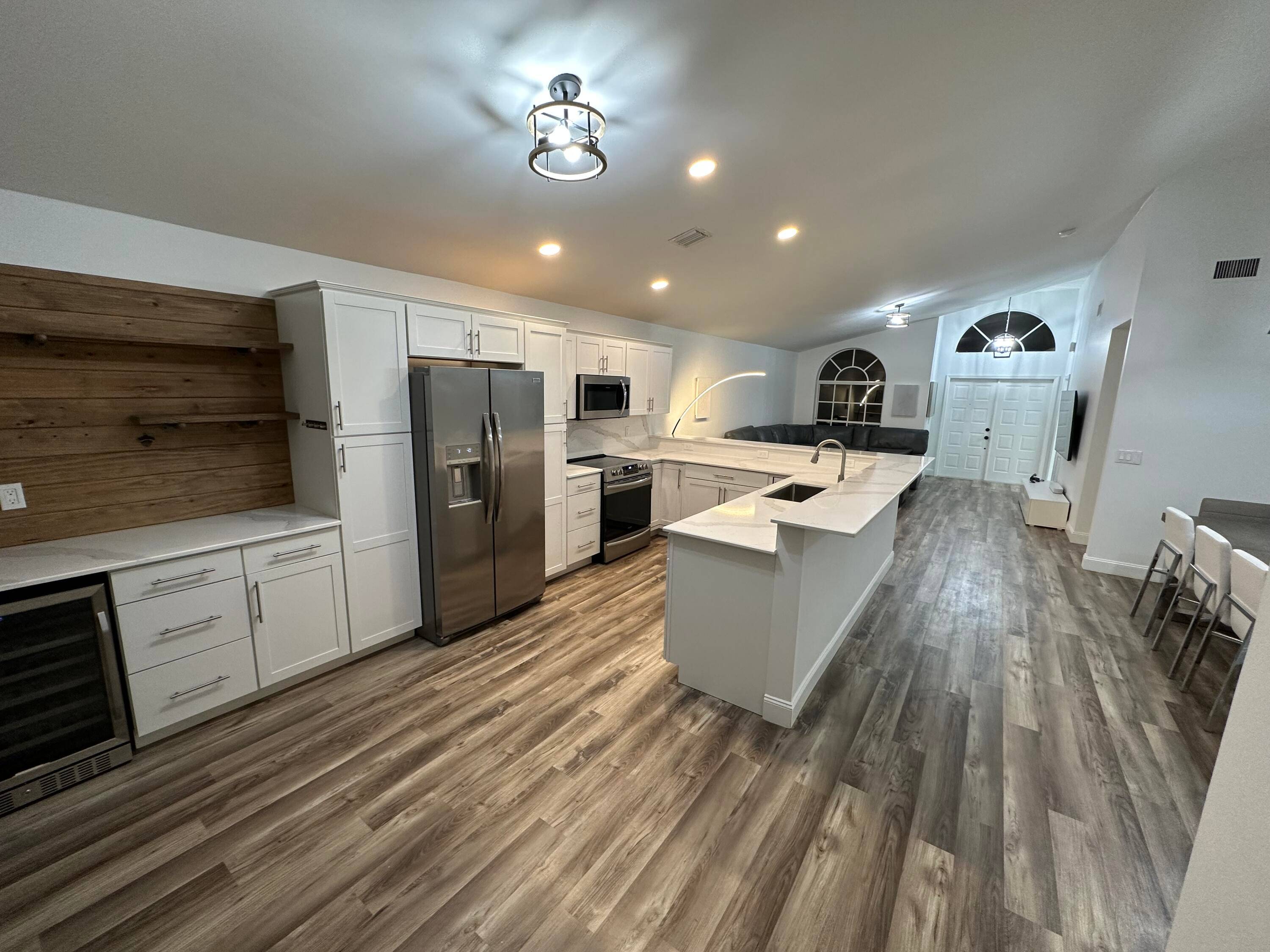 Fully furnished beautiful remodeled, 3 bedrooms, 2 bath pool Spa home in Wellington Edge.
