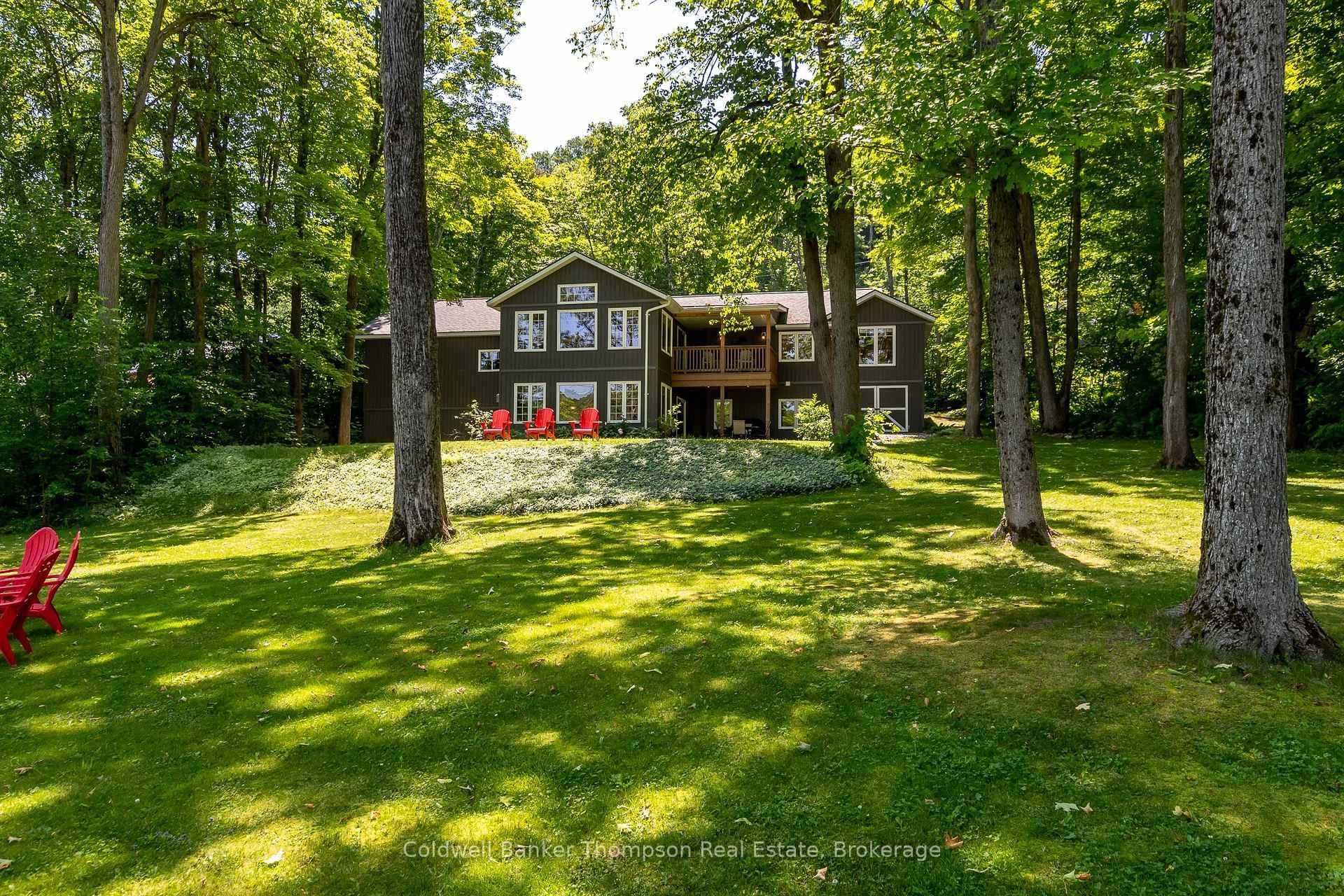 Welcome to this stunning waterfront bungalow offering luxurious living.